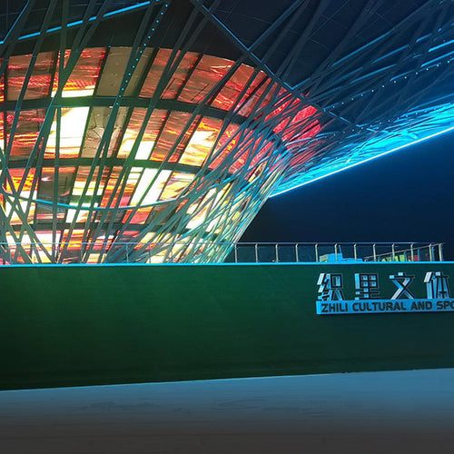 Image of Sansi LED modular screens light up the night sky of the city